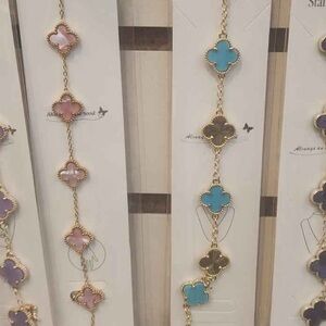 Elegant Gold and Multicolor Clover Bracelet